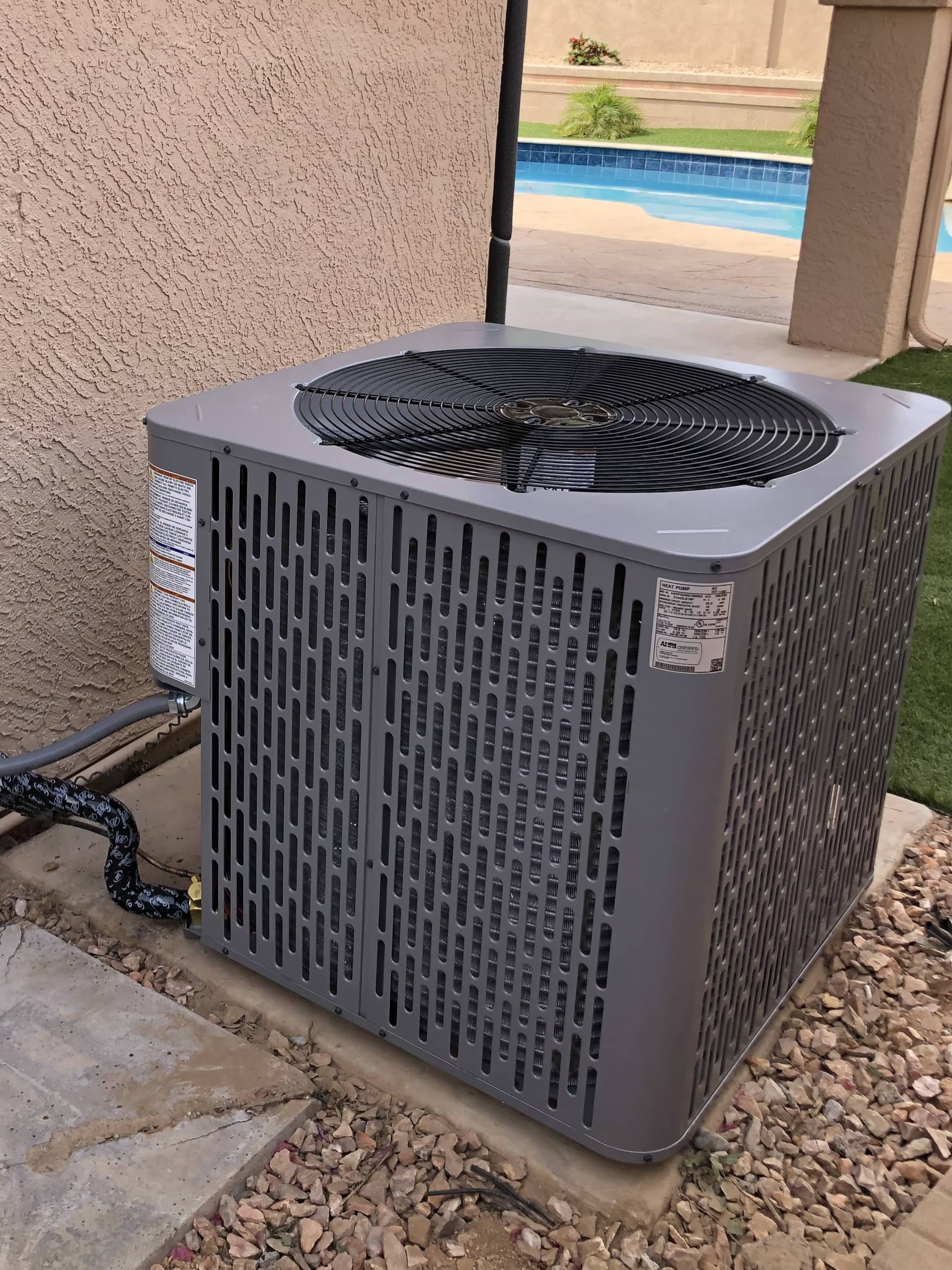 Outdoor AC unit proudly installed by PrimeTime Cooling & Heating
